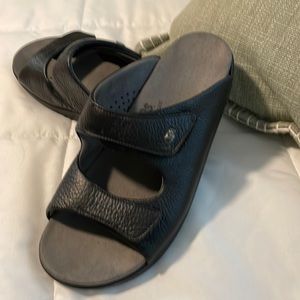 SAS sandals black 9 1/2 adjustable straps on each shoe. Most comfortable around
